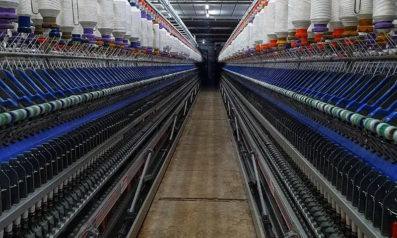 Rows of spinning machines in a textile mill